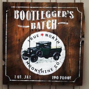 Bootlegger's Batch Moonshine sign