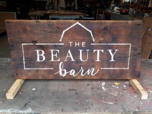 Beauty Barn rustic business sign on barn board